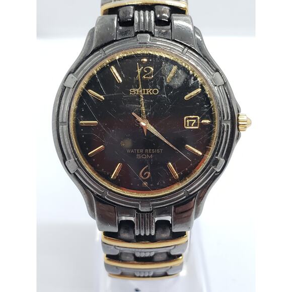 Seiko Men' dress watch. Two toned face. water resistant 50M. 7N32-0169, 971048